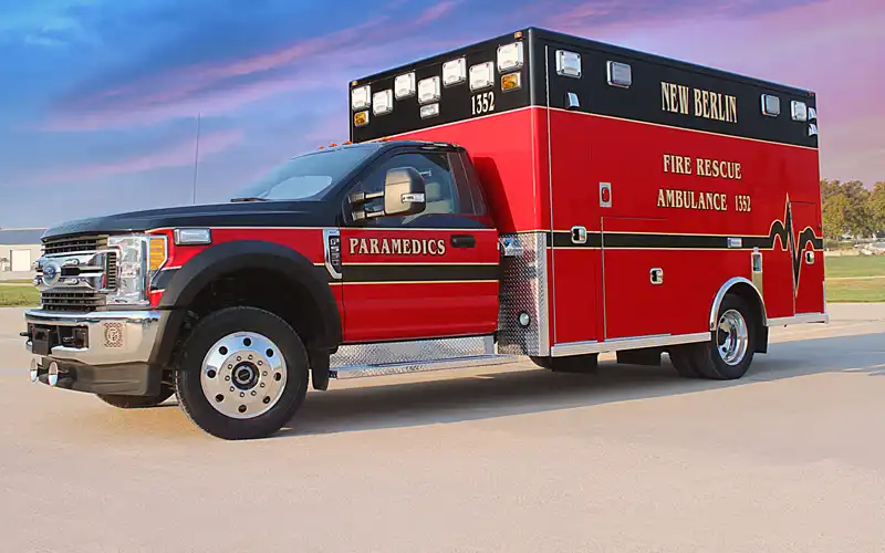 A red ambulance with black trim 