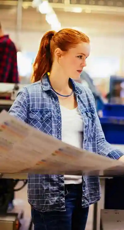 A young woman works in an active environment